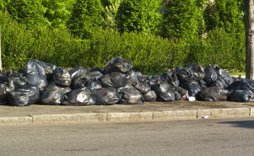 Waste collection vehicles in South London streets